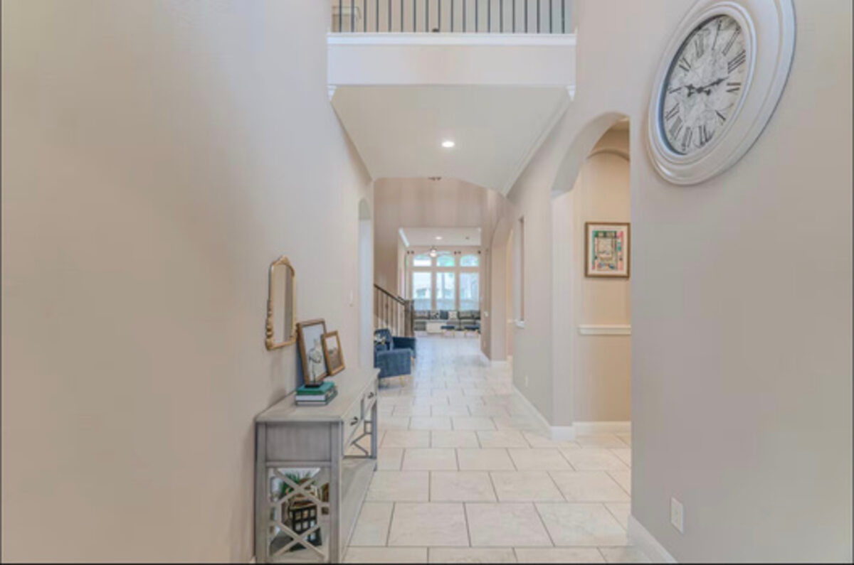 Entry hallway with vaulted ceilings